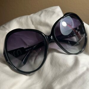 Black Miu Miu Sunglasses SMU05IS 58|13 1AB-5D1 125 3N